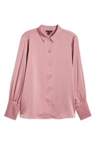 A classicc silk button-up is an essential item in every wardrobe. The crystal buttons create a festive look too. 