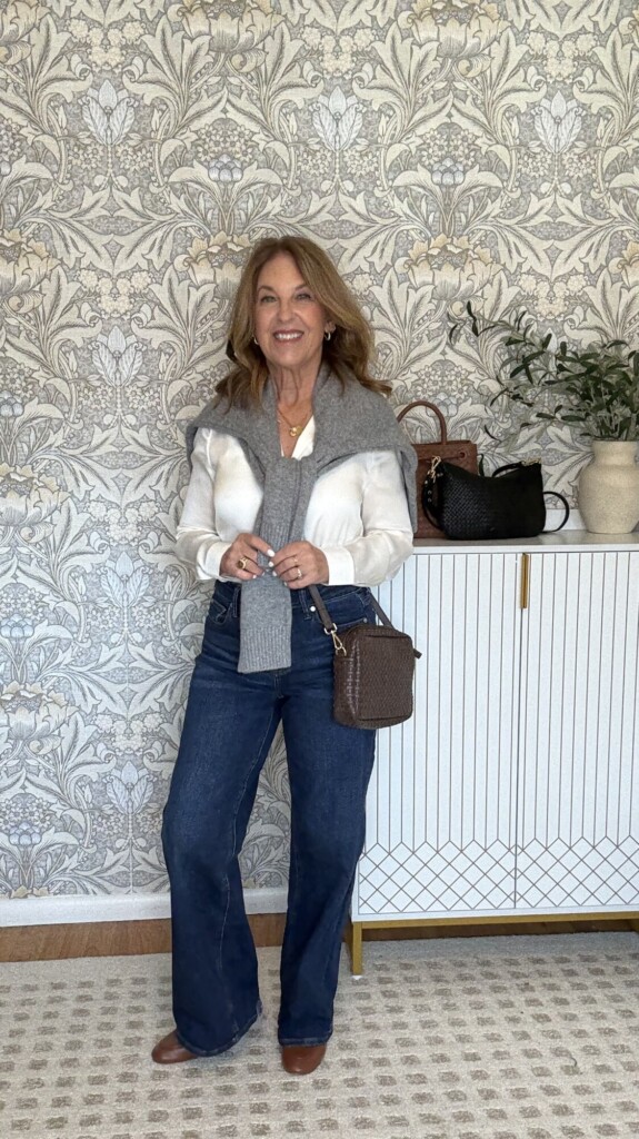 Quince cashmere sweater, jeans, washable silk button up, loafers and handwoven crossbody bag